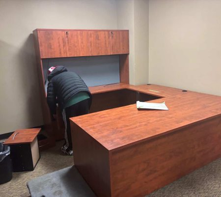 Experienced Movers Navigating Furniture Safely